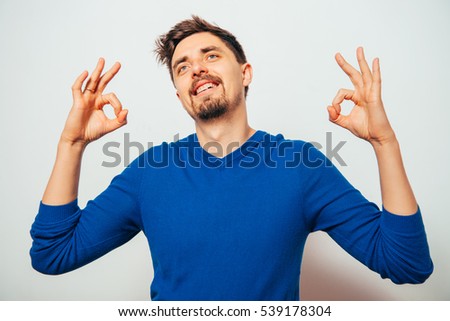 man showing okay gesture