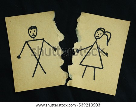 man and woman drawing torn apart on black background