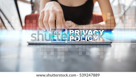 Woman using tablet pc and selecting privacy policy.
