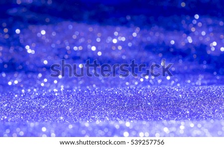blue bokeh abstract background with defocused lights