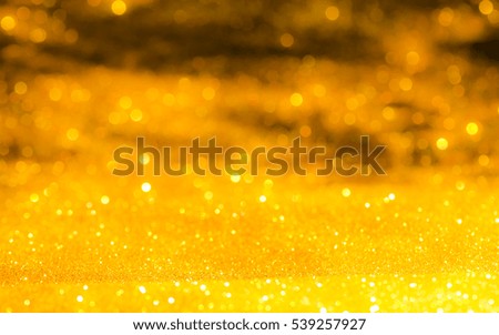 gold bokeh abstract background with defocused lights