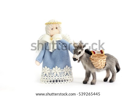 Christmas toy close up. Angel and Donkey. Isolated on white background. Donkey of natural wool. Isolated on white