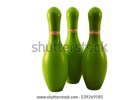 Children's set to play bowling. Ball and green bowling pins.