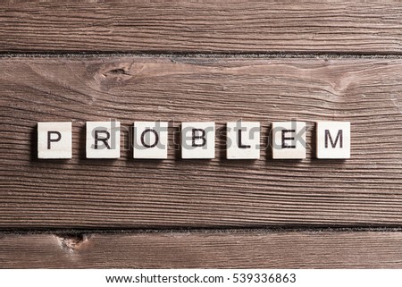 Business problem word collected of elements of wooden elements with the letters