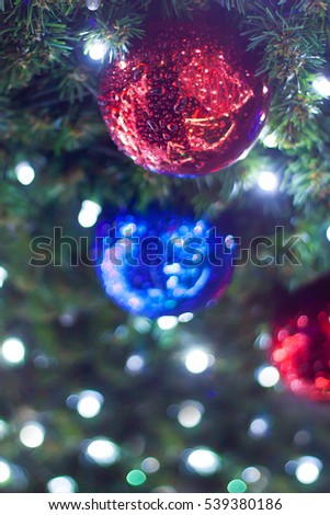 Christmas tree and holiday decorations in the central square of the city during the Christmas Fair. Blurred images and beautiful bokeh.