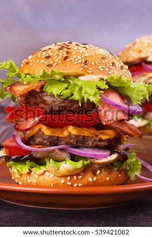 Burger With Beef, Bacon, Tomato, Cheese, Lettuce and Onion and Parmesan Eggplant