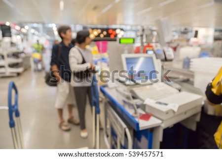 blur picture background  of customer queue for pay money at shopping counter  cashier  Ã Â¹?Ã Â¸Â£Ã Â¸Â°Ã Â¹? customer assistant in furniture mall 
