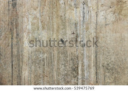 Traces of time on the wall. Old concrete background. Faded walls. Abstract textures.