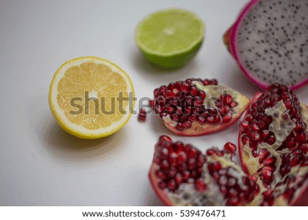 Ripe & Fresh Exotic Fruits - Pomegranate, Lemon, Lime & Dragon fruit