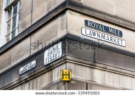 street name signs at a house wall in Edinburgh, Scotland, UK