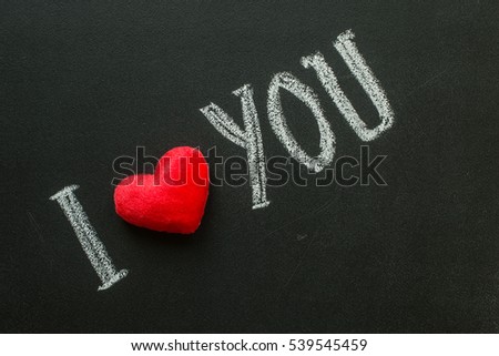 I Love You. Handwritten message on black chalkboard