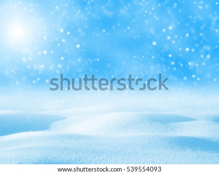 Winter festive background. Winter landscape with brilliant snow in the sunlight.