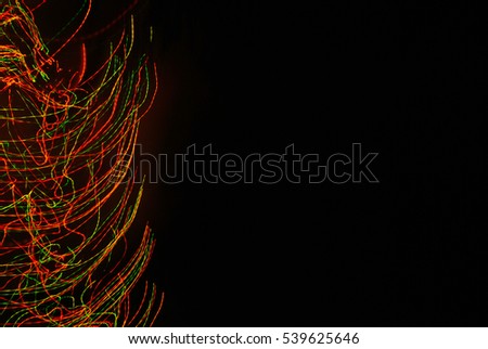 Abstract colored lights on a black background