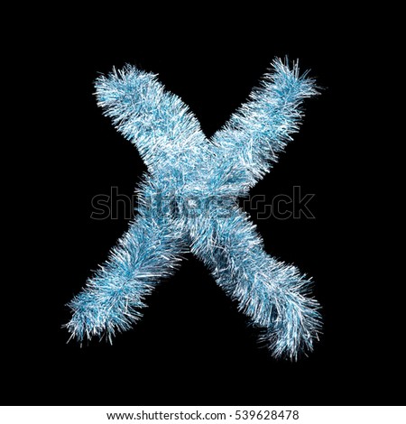 Festive alphabet made of blue tinsel. Letter X on black background. Isolated