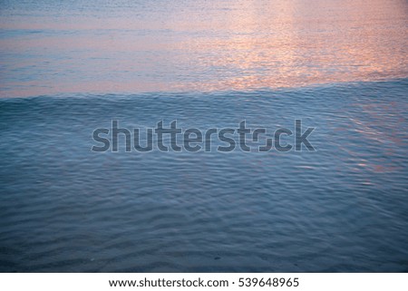 beautiful wave texture at sunset, colorful texture