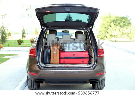 Car trunk with baggage Royalty-Free Stock Photo #539656777