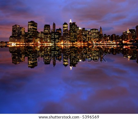 New York City skyline at night (two images merged)