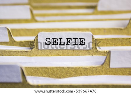 Selfie word on card index paper