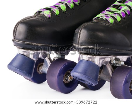 Close up of retro roller skates isolated on white background