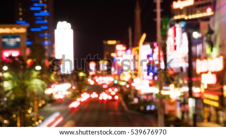 Defocused blur of Las Vegas Boulevard at sunset - Bokeh abstract view of world famous Place in Las Vegas - United States of America 