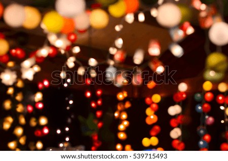Colorful lanterns against dark background. Christmas Background.