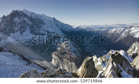 Aerial Views of the French alps peaks in bright sunshine.