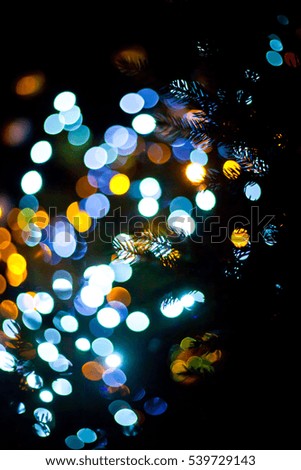 Christmas tree and holiday decorations in the central square of the city during the Christmas Fair. Blurred images and beautiful bokeh.