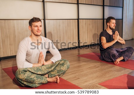 two men in the Lotus position