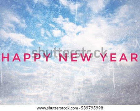 Happe New Year text with sky background