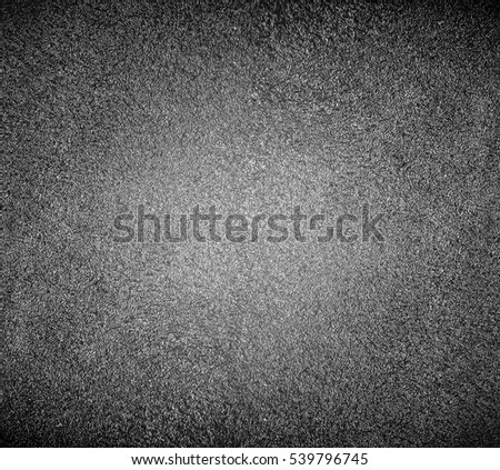 Abstract background of closeup asphalt dark black texture with rock uneven surface on urban empty street outdoor Perspective wide angle view to new road hard structure macro detail, industrial pattern