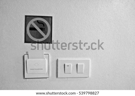 no smoking sign in the hotel room, black and white color