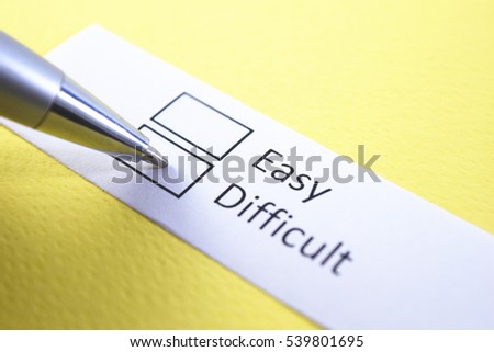 Easy or difficult? Difficult. Royalty-Free Stock Photo #539801695