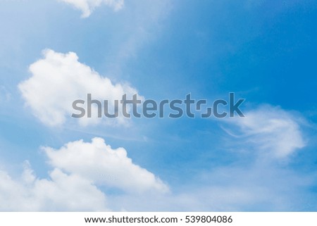 Fluffy Cloud and Blue sky on day time for background.