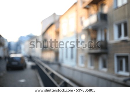 Car parked on a street, blurred