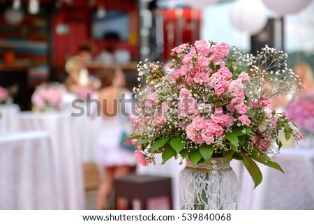Wedding decor with flowers. Bright picture, with soft focus.