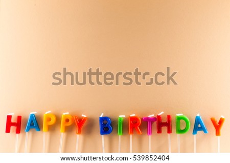 Many Colored Candles with Text Happy Birthday