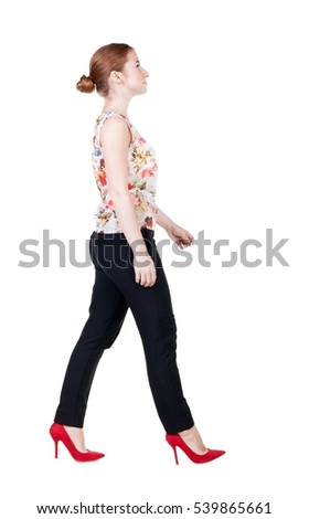 walking red head business woman. back view. going young girl in  suit. Rear view people collection.  back side view of person.  Isolated over white background.