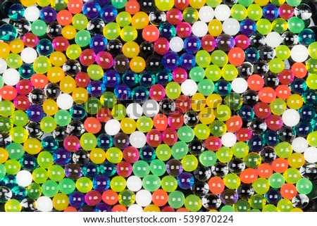 Colorful polka dots sweet jell candy isolated on seamless background / celebration funny gelatin transparent water balls for party day texture