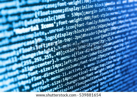 Website HTML Code on the Laptop Display Closeup Photo. Abstract IT technology background.  Internet security hacker prevention. Desktop PC monitor photo. Big data database app. 
