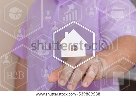The concept of finding housing for rent or purchase . Businessman clicks with web icon Home on the touch screen in the web network. 