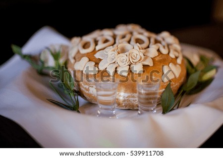 Wedding bread with salt and wodka detail - traditional polish inviting to Bride and Groom.