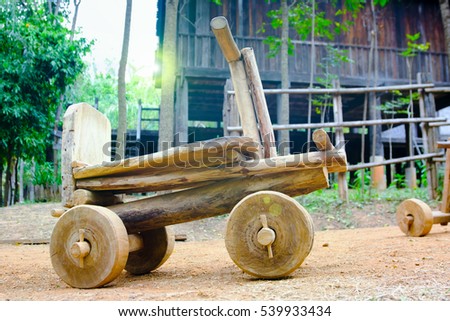 Wooden toy car sleigh  at countryside, Thailand.