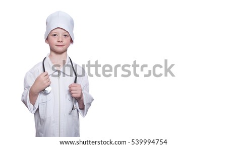 Boy dressed as a doctor on a white background. Isolated on white. Place for text.