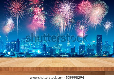 wood shelf on fireworks over night city background