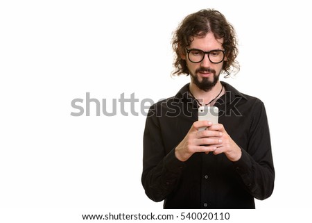 Handsome Caucasian man using mobile phone