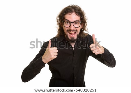 Happy handsome Caucasian man giving thumbs up