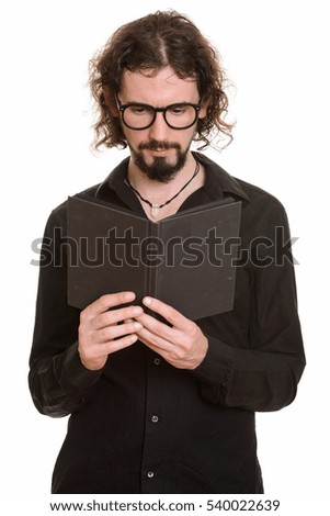 Handsome Caucasian man reading book
