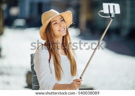 Travel Vacation Tourist Selfie. Woman taking self-portrait photo on Europe. Girl on summer vacation visiting famous tourist destination having fun smiling