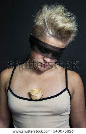 photo girl transparent black blindfold portrait with rose looking down