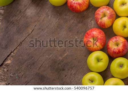 apples on a old wooden table, studio picture, with copy space. Free space for text